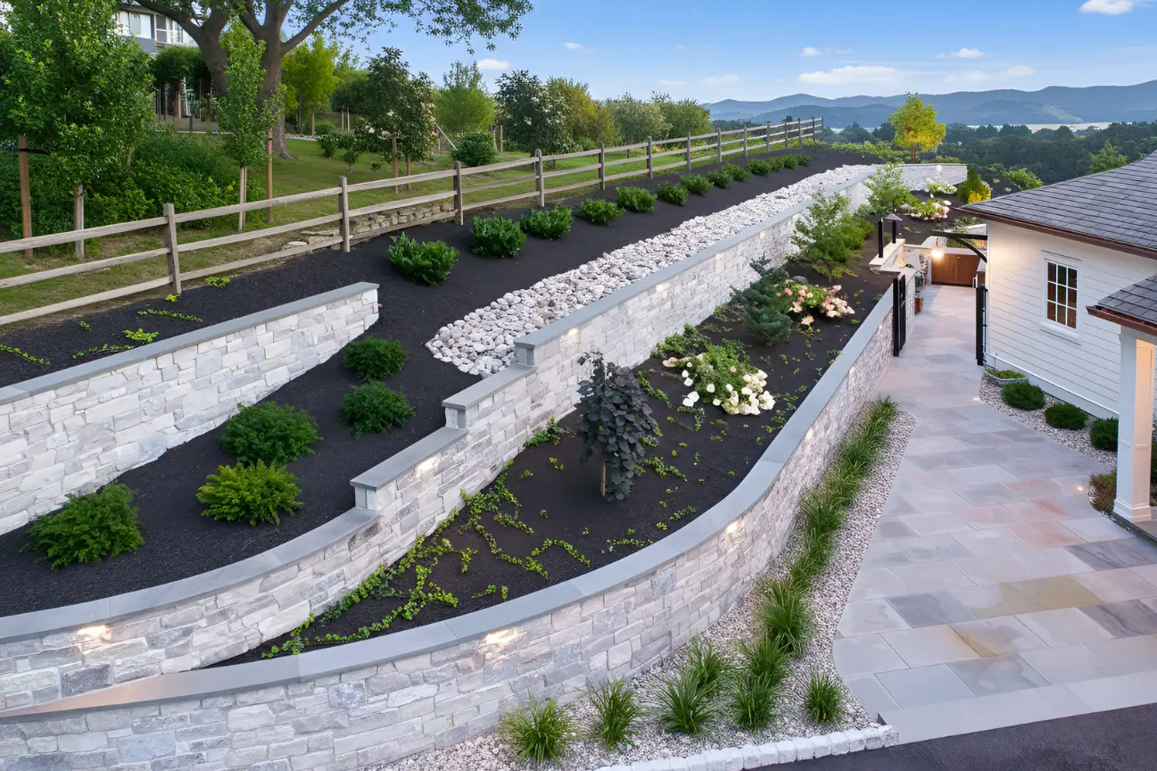 Curved light-grey stone RHL Build HB Retaining Walls with integrated lighting at a Hawkes Bay property.